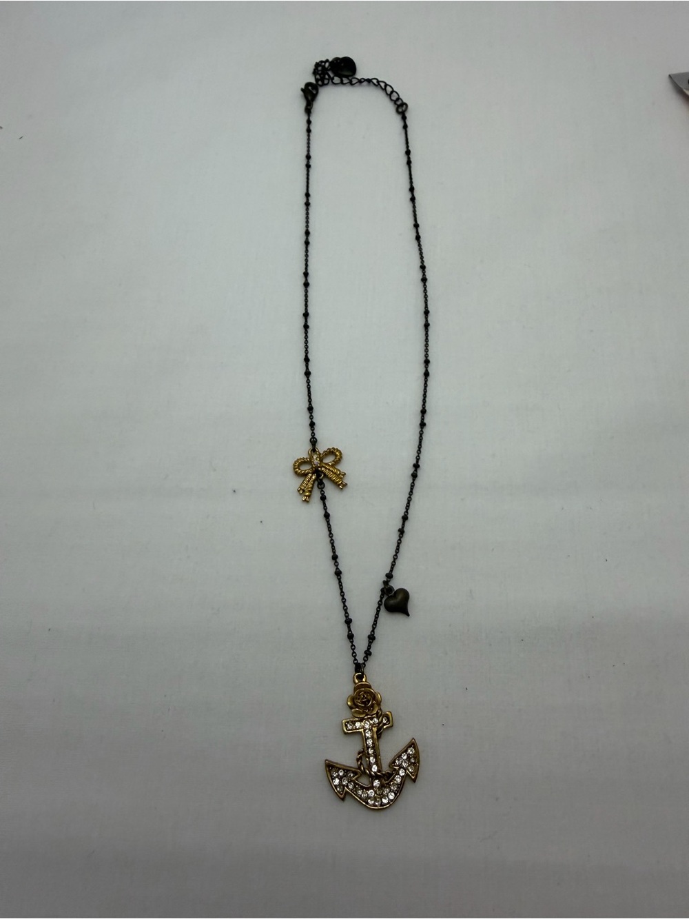 Betsey Johnson Gold and Black Anchor Necklace with Bow & Heart Charms